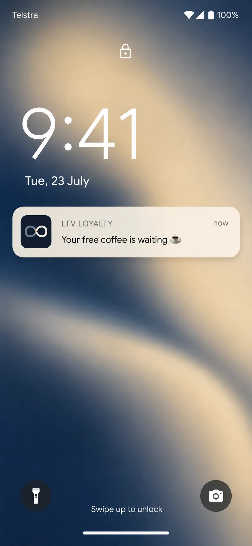 Phone lock screen showing an LTV Loyalty push notification: Your free coffee is waiting